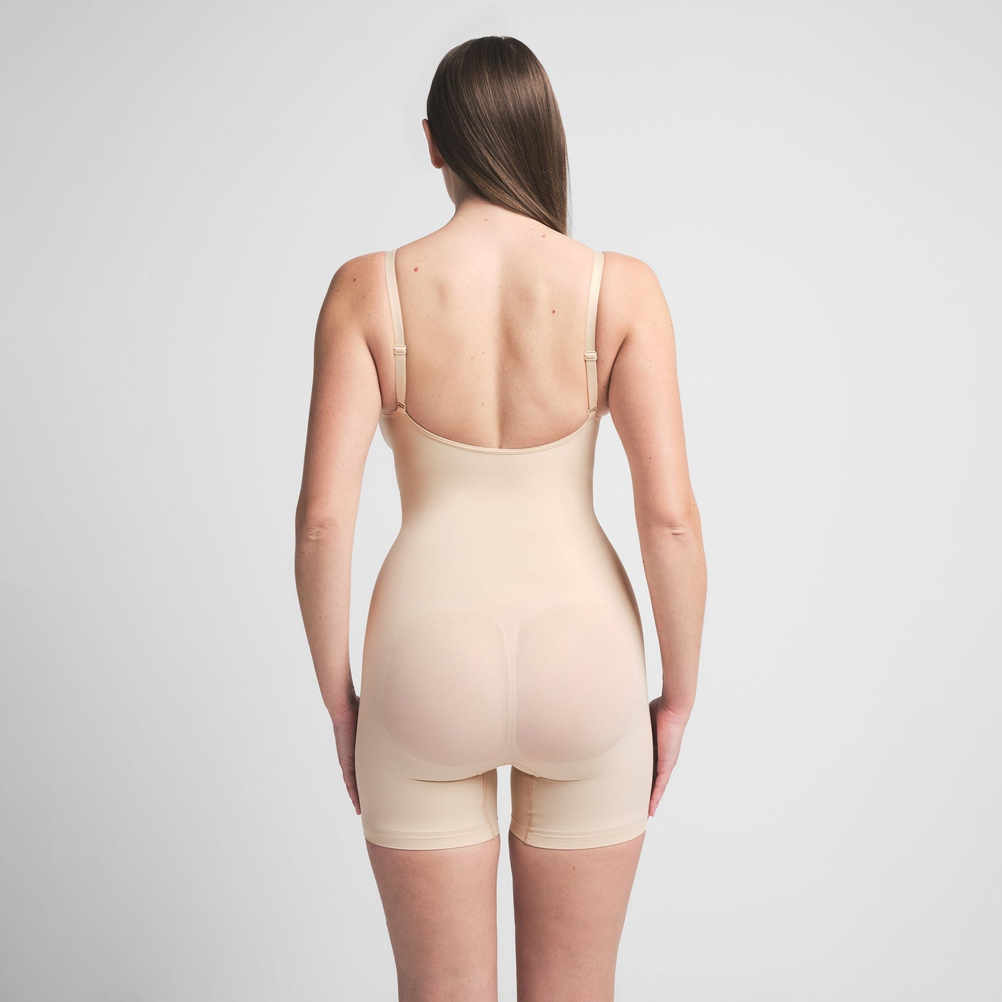 SEAMLESS SCULPT MID THIGH BODYSUIT | SAND