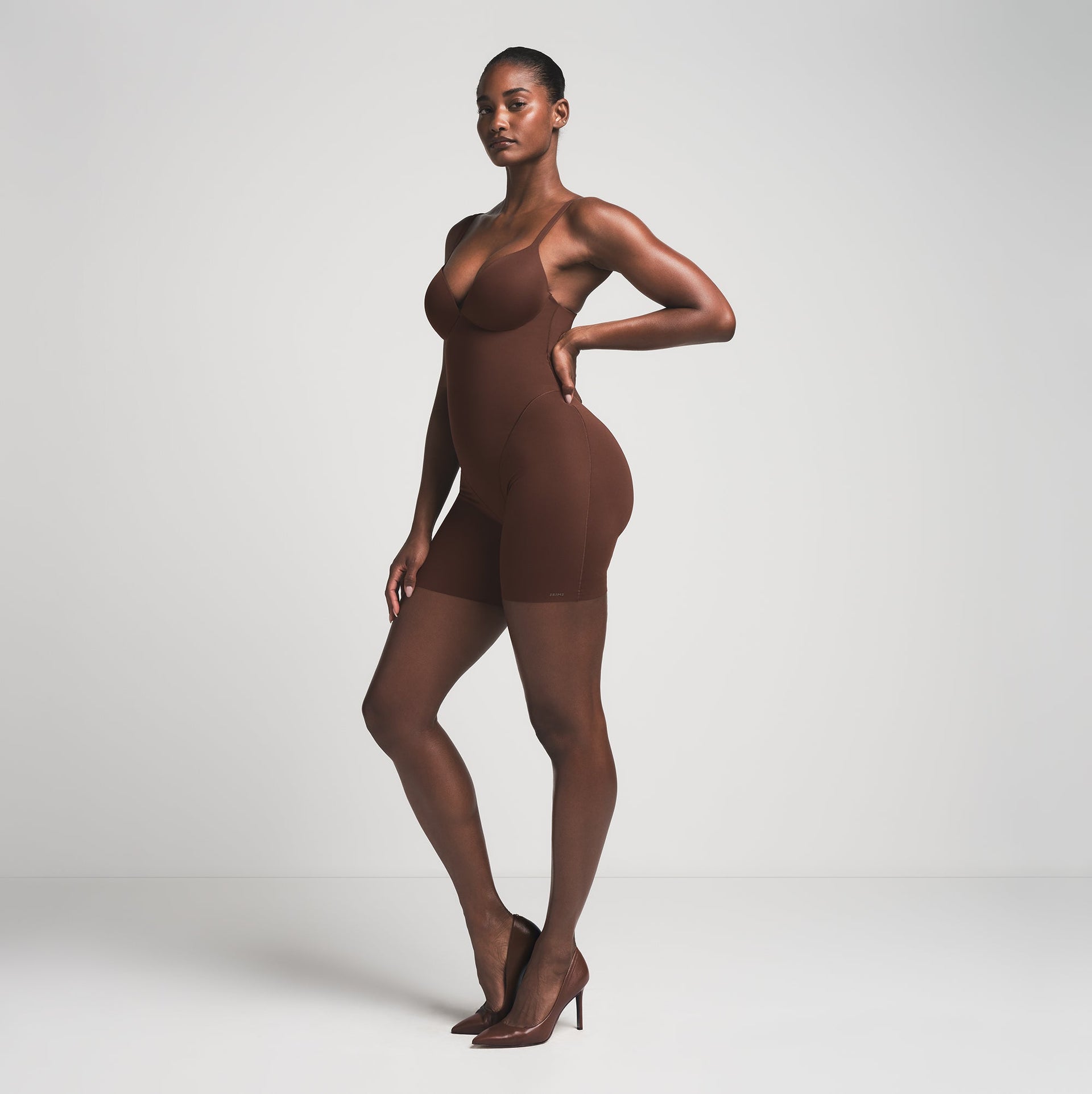 SKIMS ULTIMATE BODY PUSH-UP BUTT ENHANCING PADDED MID THIGH BODYSUIT | COCOA