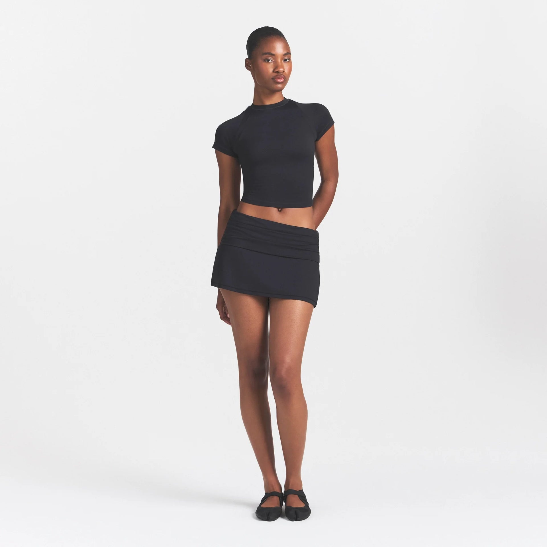 NikeSKIMS AIRY DRI-FIT™ BABY TEE | OBSIDIAN