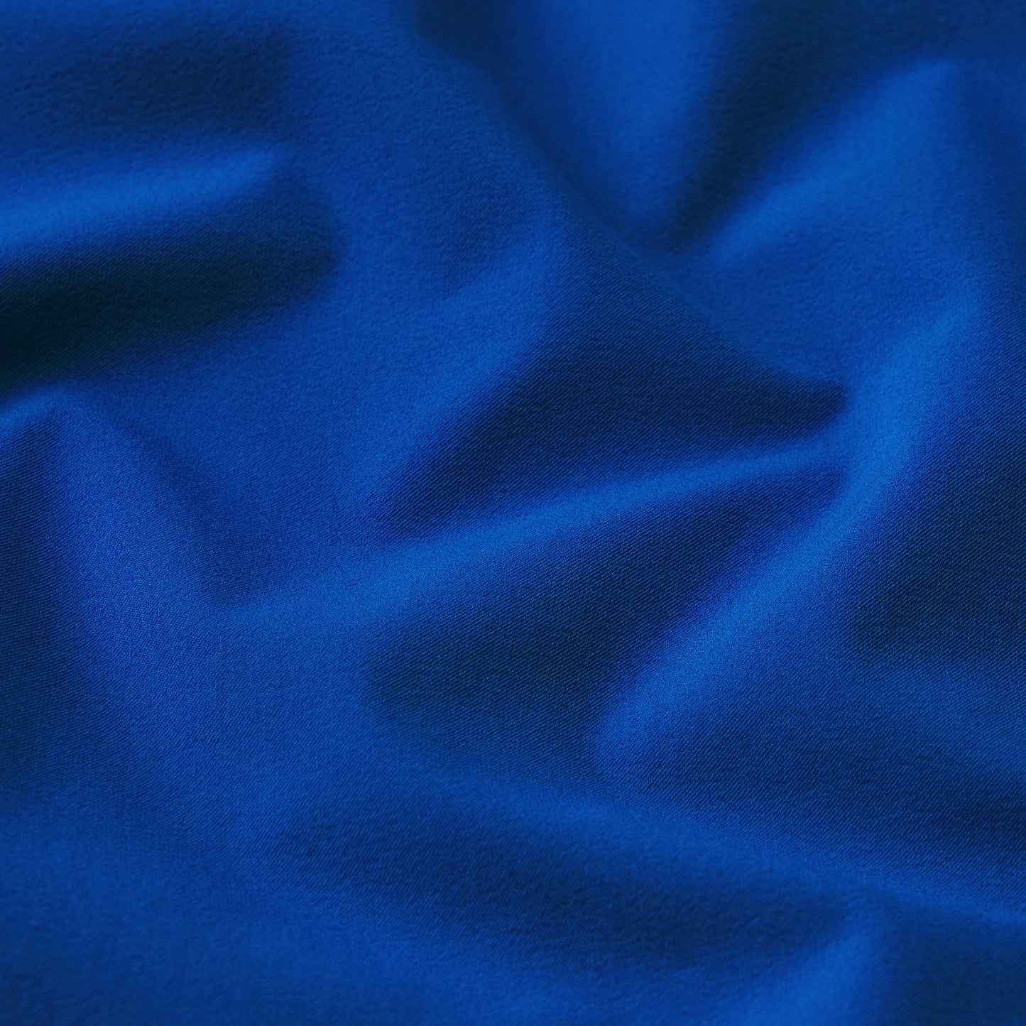 NikeSKIMS STRETCH NYLON OVERSIZED TRACK JACKET | COBALT