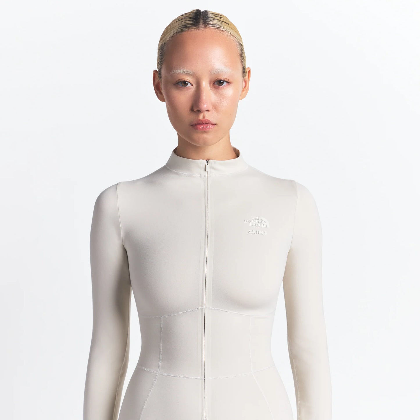 THE NORTH FACE X SKIMS REFINA BODYSUIT | BONE