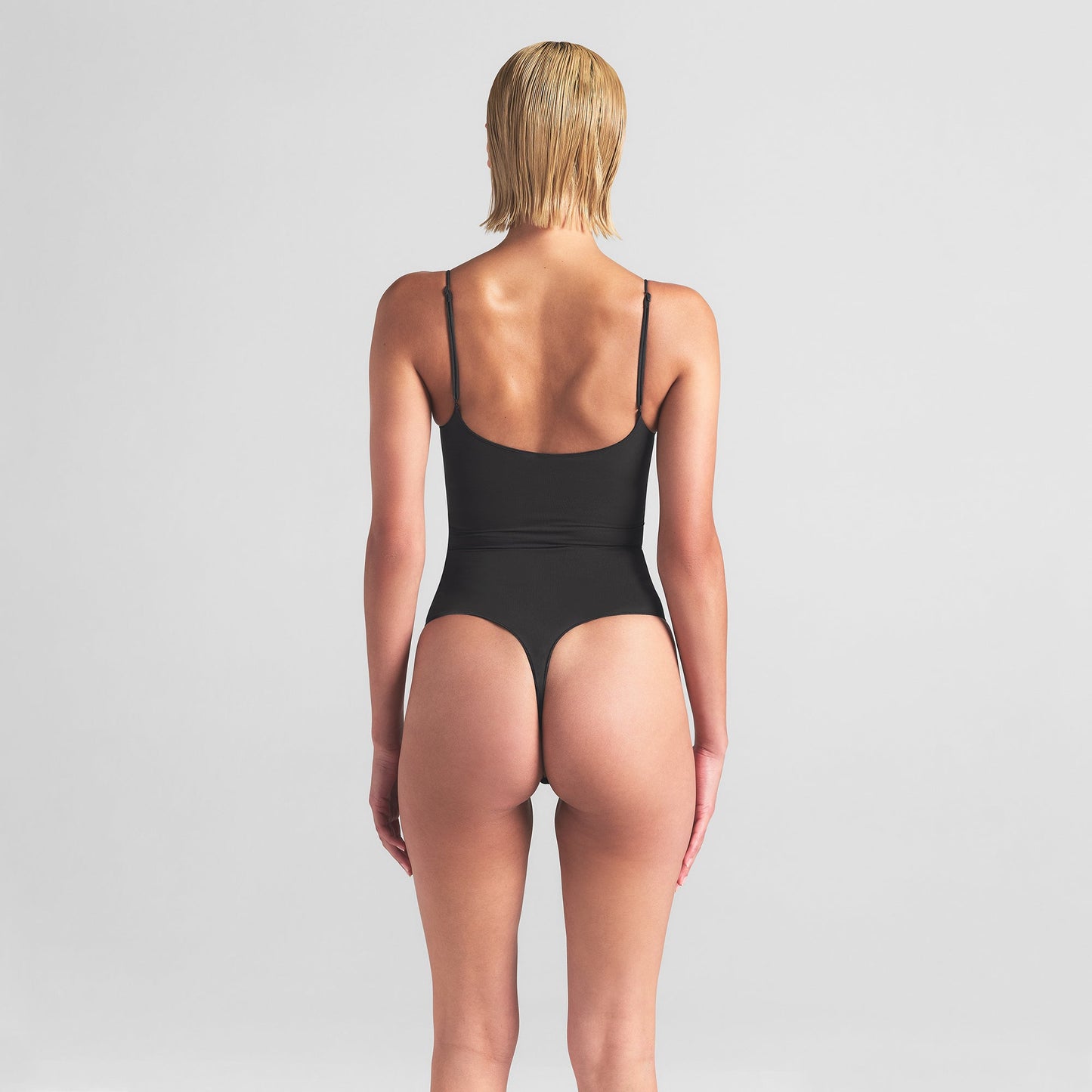 SHEER SEAMLESS THONG BODYSUIT | ONYX