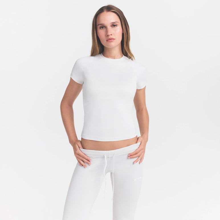NikeSKIMS AIRY DRI-FIT™ BABY TEE | IVORY