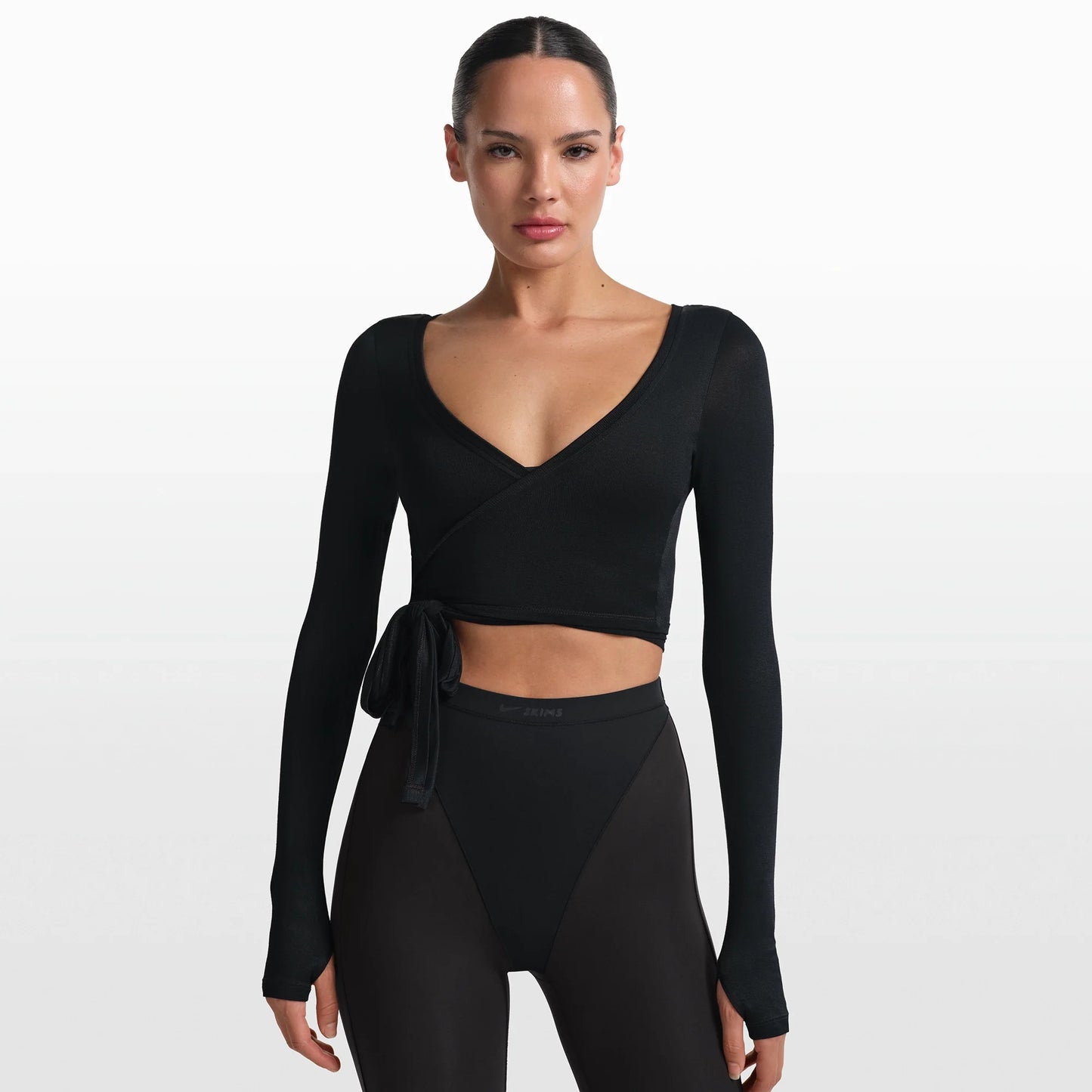 NikeSKIMS STRETCH KNIT WRAP LONG SLEEVE CROPPED TOP | OBSIDIAN
