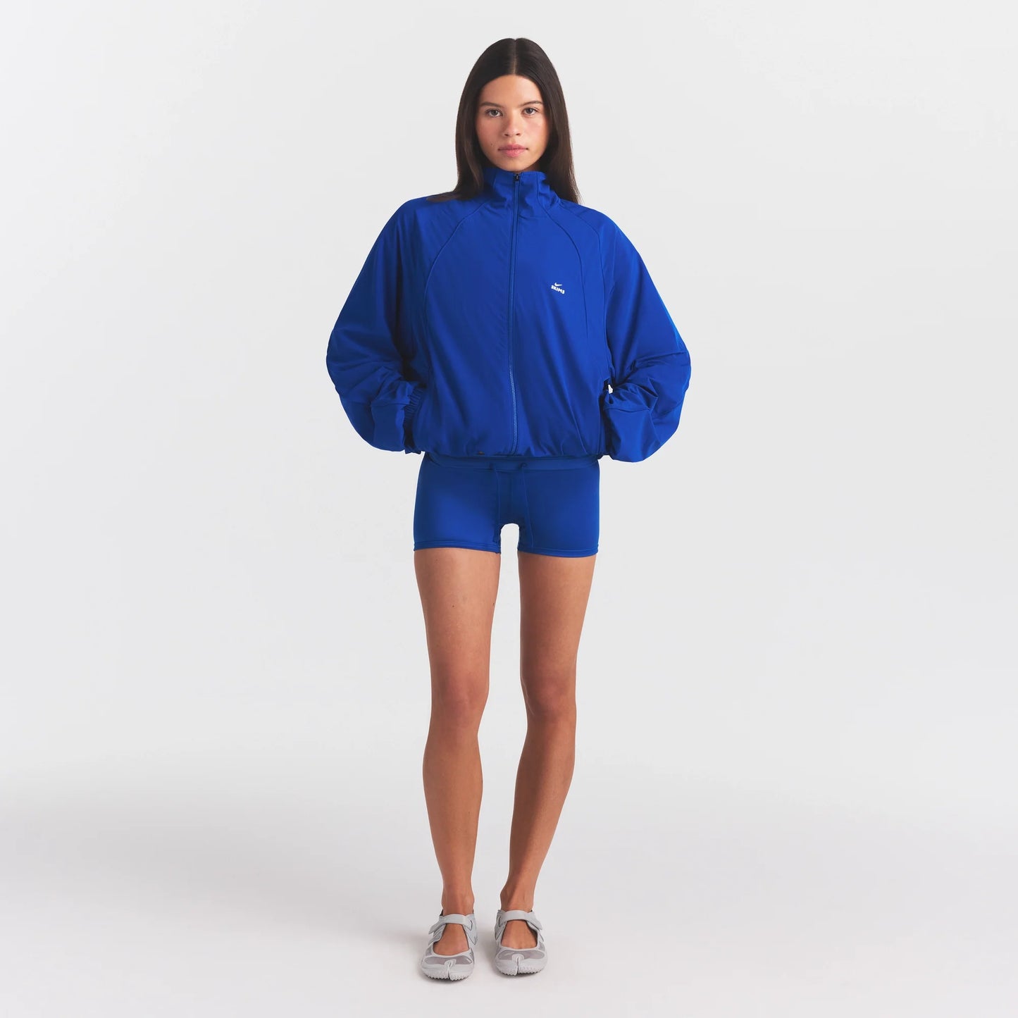 NikeSKIMS STRETCH NYLON OVERSIZED TRACK JACKET | COBALT
