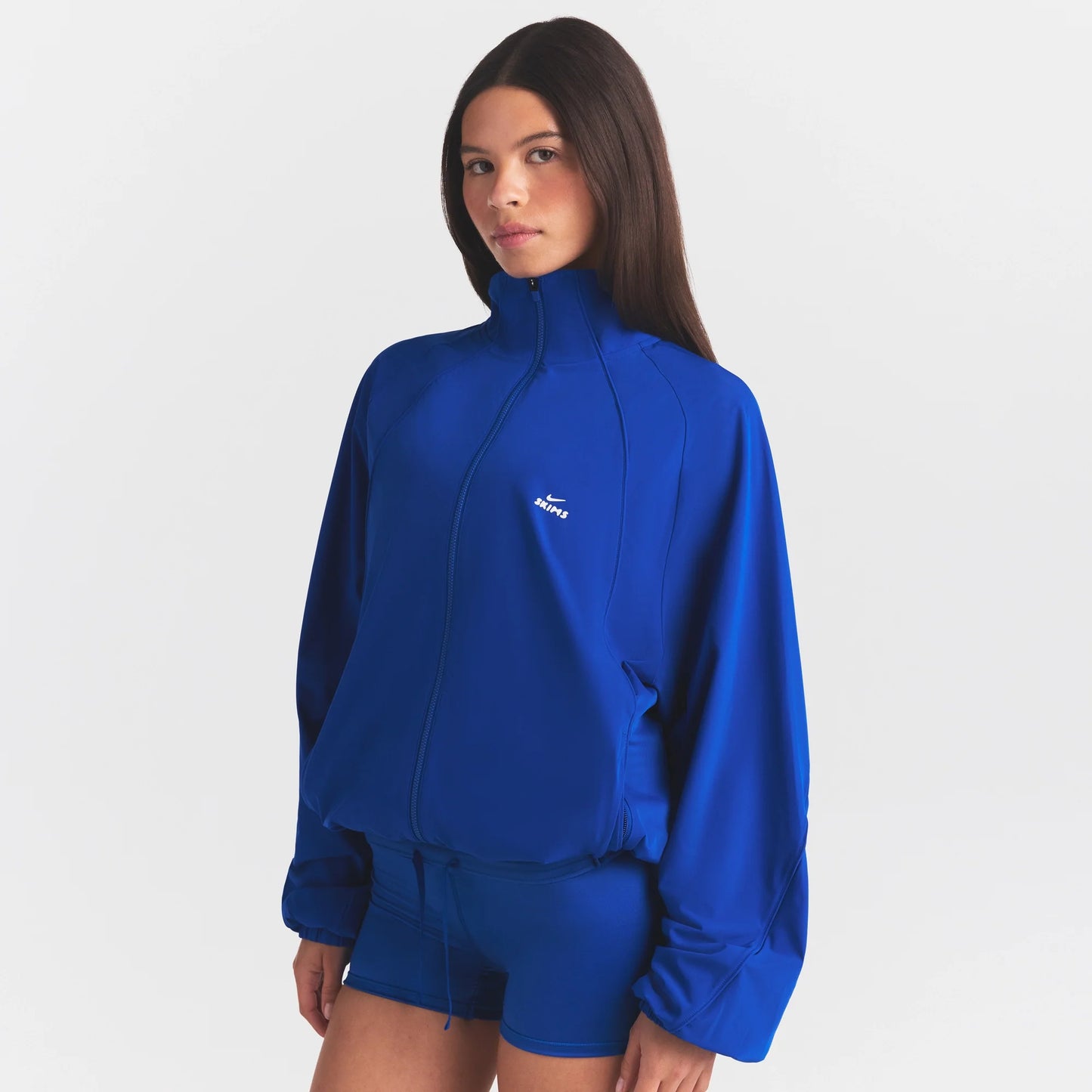 NikeSKIMS STRETCH NYLON OVERSIZED TRACK JACKET | COBALT