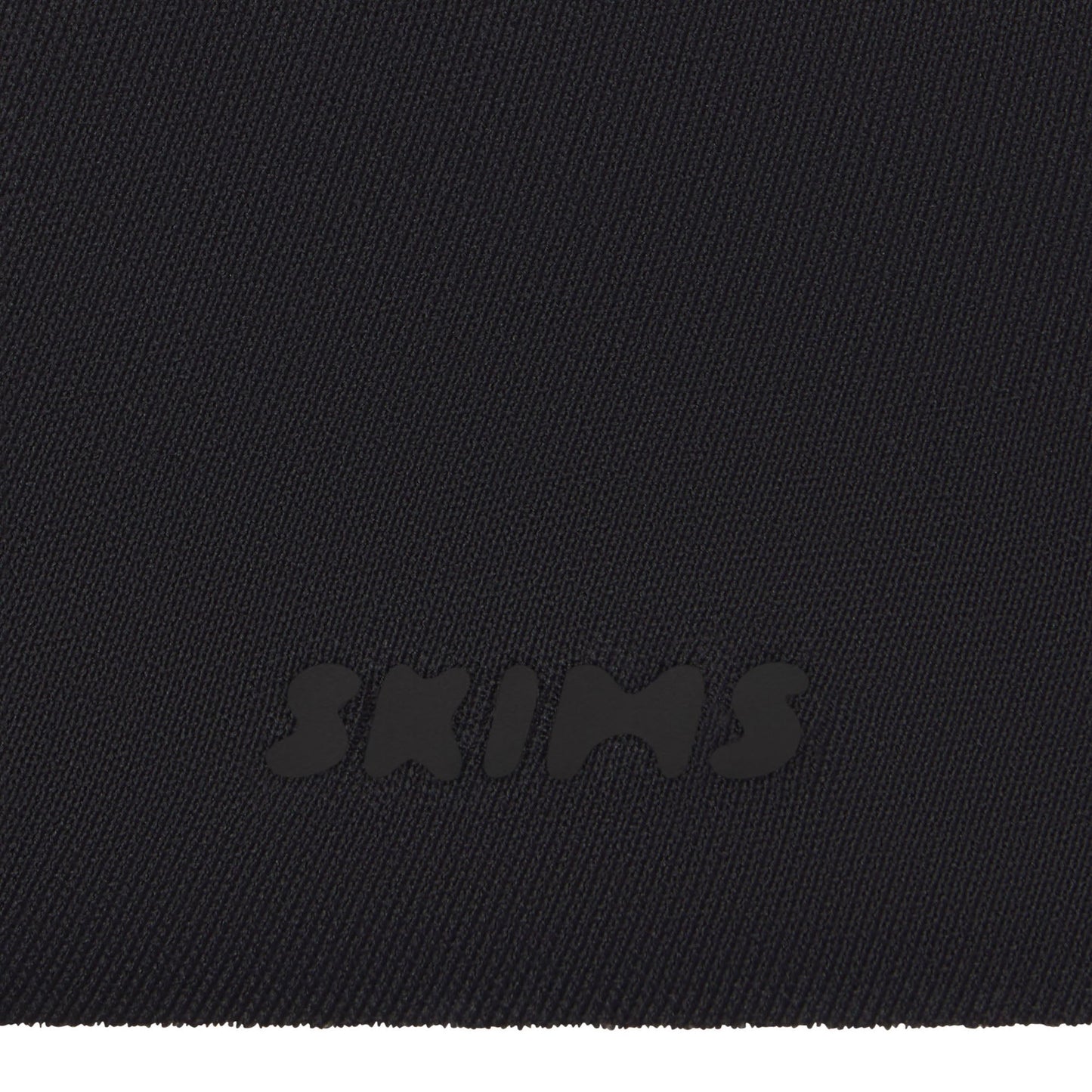 SKIMS ULTIMATE BODY PUSH-UP THONG BODYSUIT | ONYX