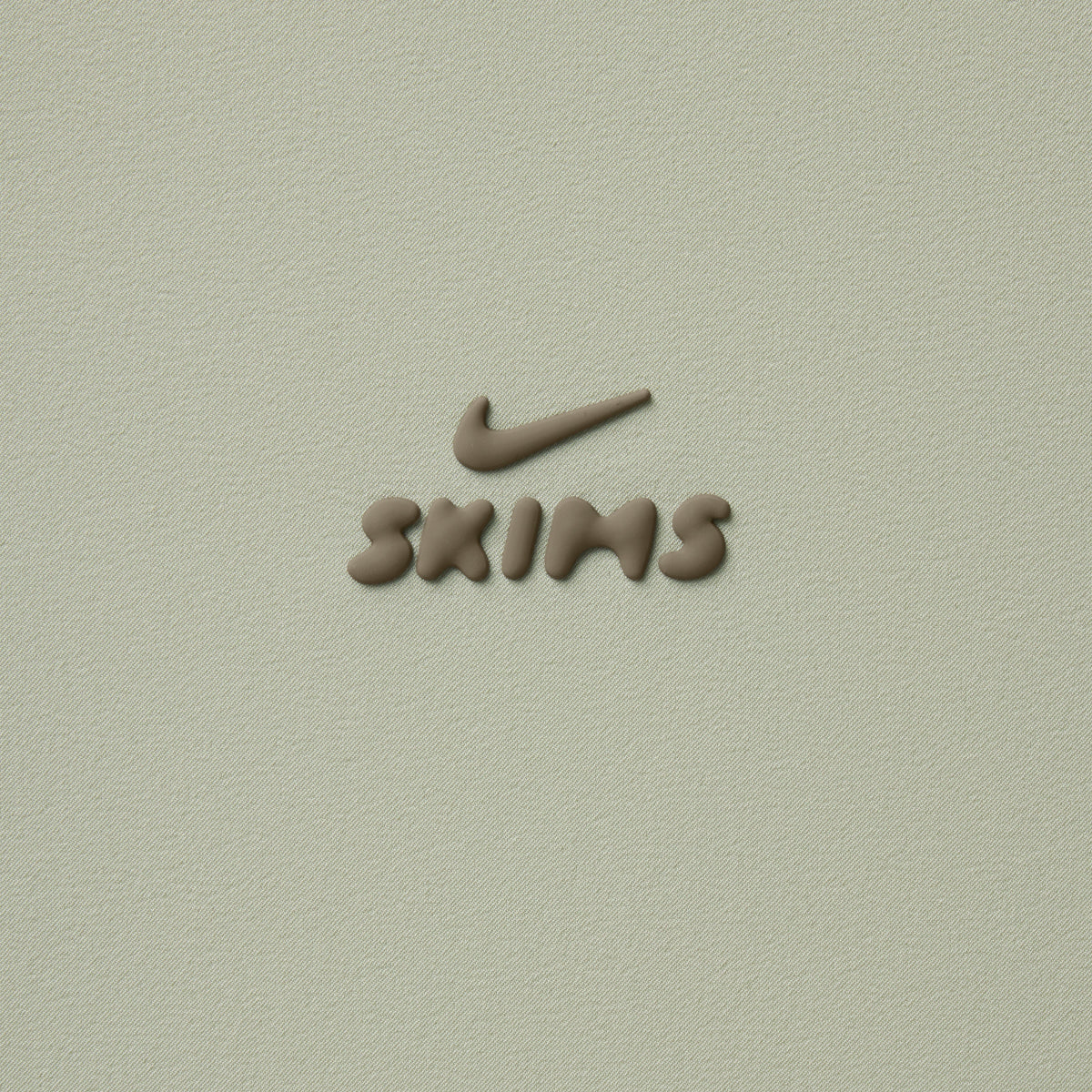 NikeSKIMS STRETCH NYLON OVERSIZED TRACK JACKET | TALC