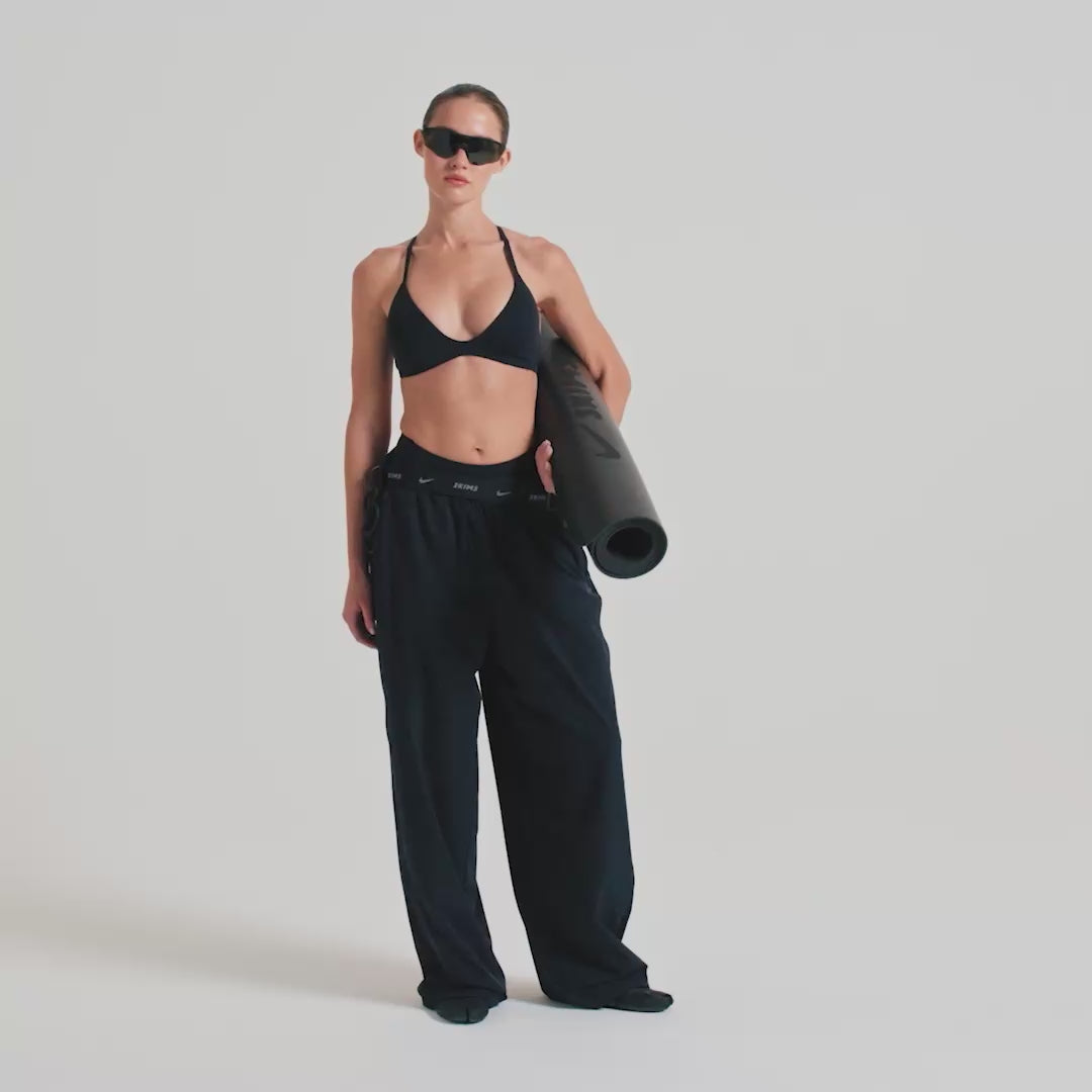 NikeSKIMS STRETCH NYLON OVERSIZED PANT | OBSIDIAN